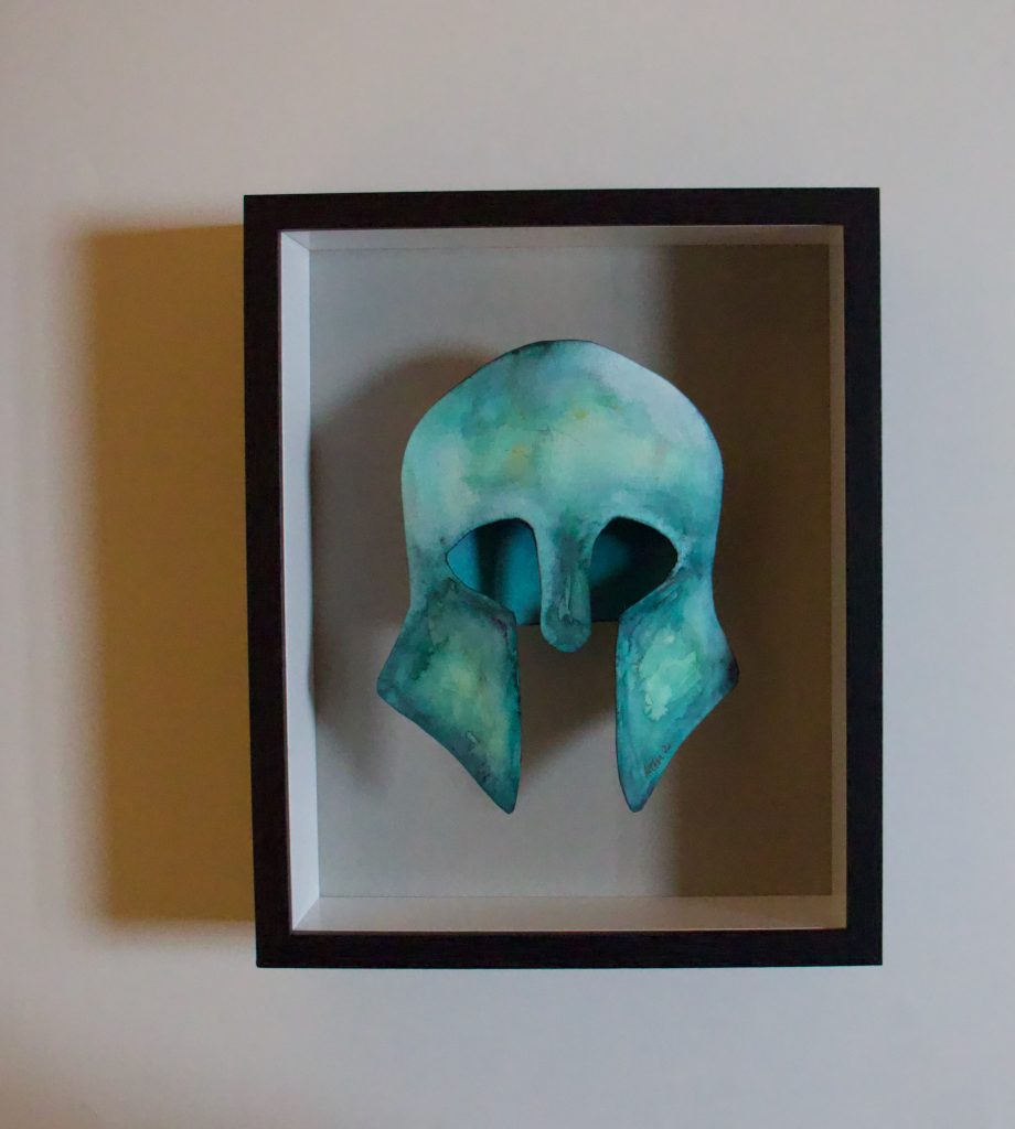 watercolour and paper sculpture of Etruscan helmet in shadow box